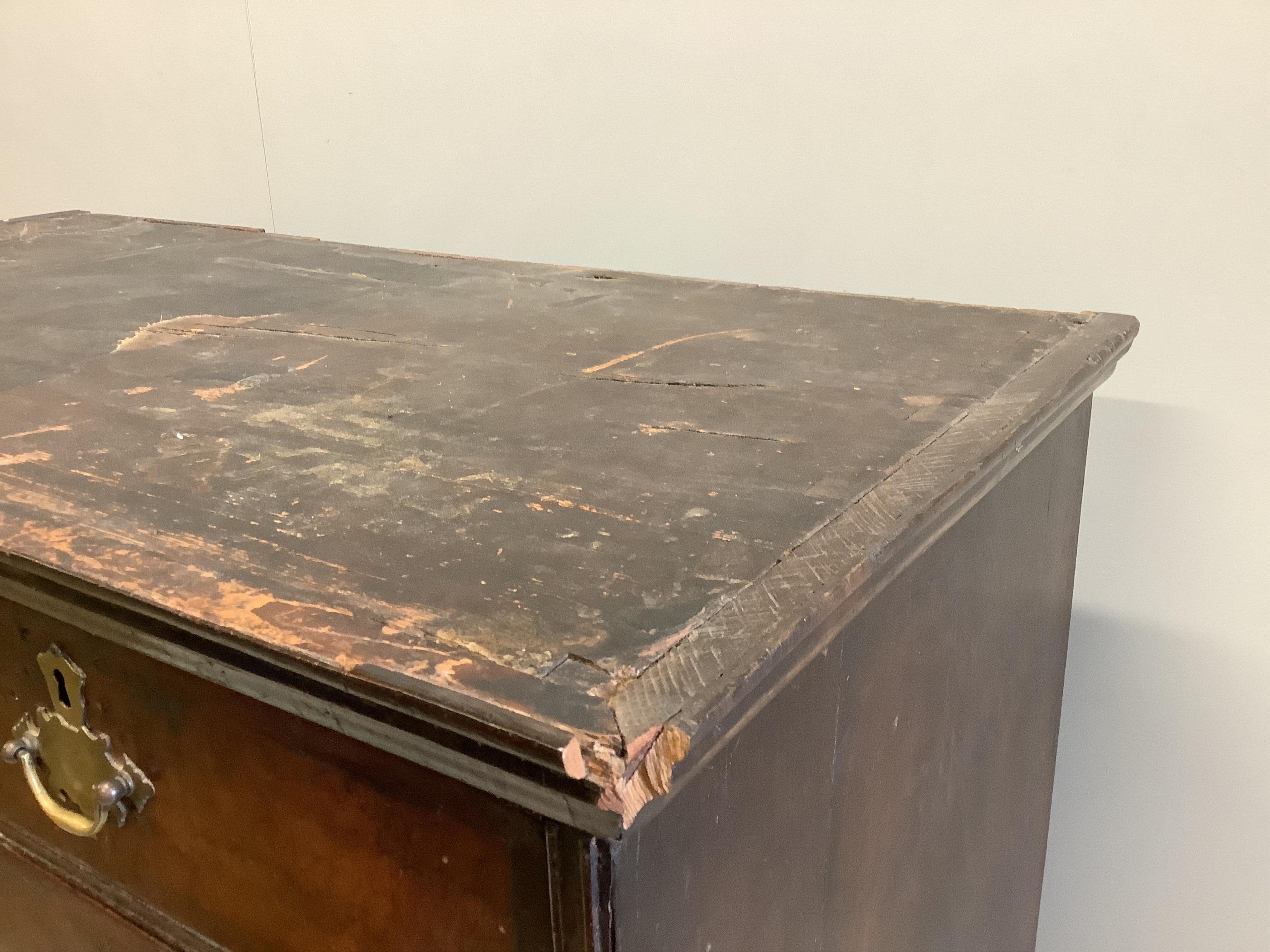 An 18th century walnut chest on stand, width 98cm, depth 50cm, height 152cm. Condition - fair